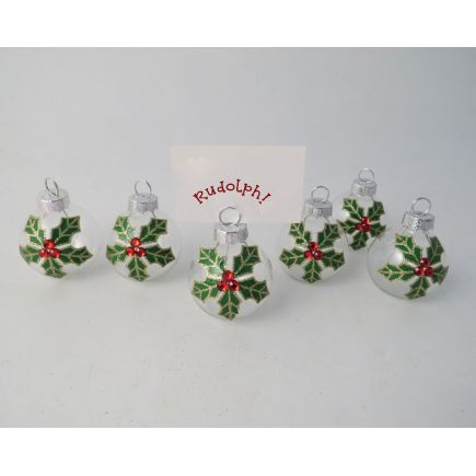 Set of 6 glass bauble shaped name card holders with holly design.