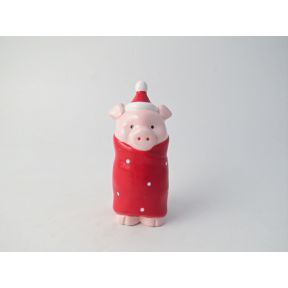 Ceramic pig in blanket standing figure.