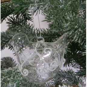 Glass bird shaped tree decoration with swirl.