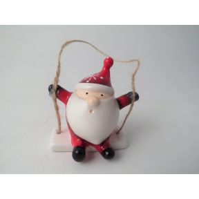 Ceramic Santa on swing hanging decoration.